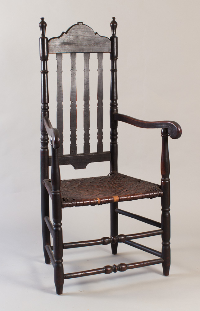 A very fine William and Mary banister-backed armchair