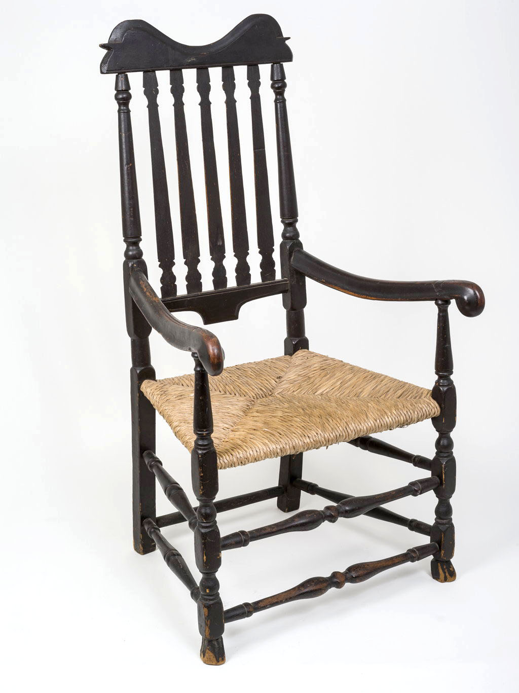  A rare William and Mary banister-backed armchair