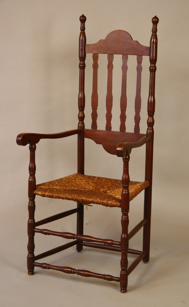 A fine and rare bannister-backed armchair