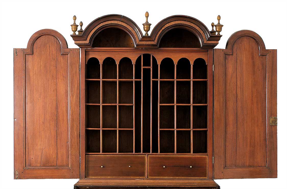 A very rare William and Mary period ball-footed desk/bookcase