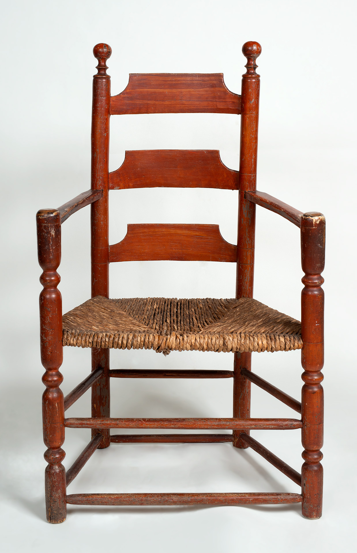 An early, 1720-30,  three slat armchair 