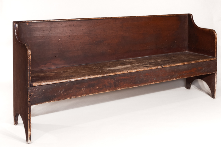 A very fine country bench with molded edge to top rail and seat and with cut-out ends