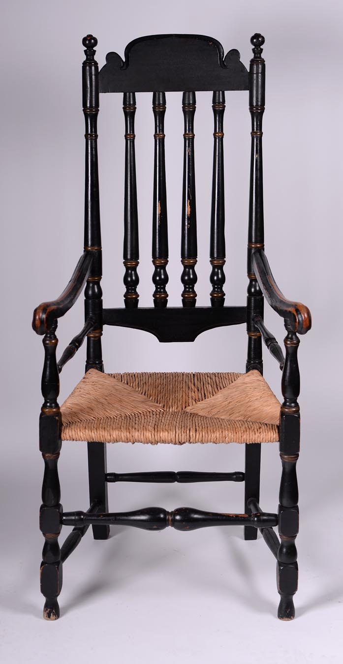 A fine and rare canted back William and Mary banister backed armchair